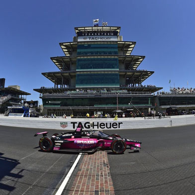 Indianapolis 500 Indy Car crossing the finish line at Indianapolis Motor Speedway