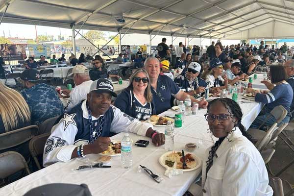 Sports Traveler Guests enjoying a pre game meal at our tailgate party