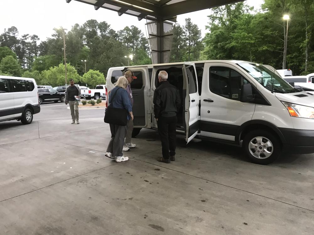 Transportation to and from Augusta National via private vans