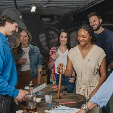 Derby guests enjoying a bourbon distillery tour and tasting