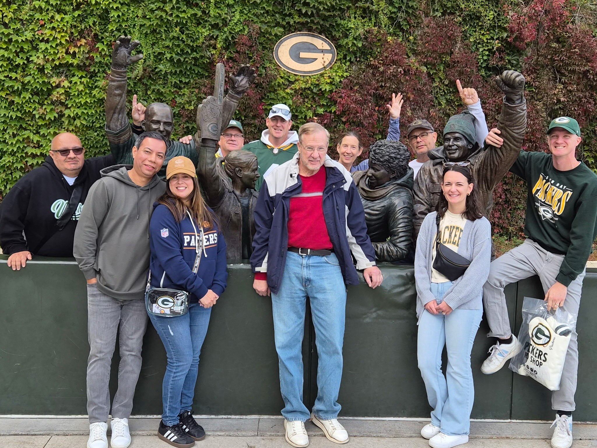 Met some new friends this week.. thanks to our guests who joined us in Green Bay! (This picture is at the “Lambeau Leap” statue outside of the stadium) #tourlife #lambeaufield #greenbay