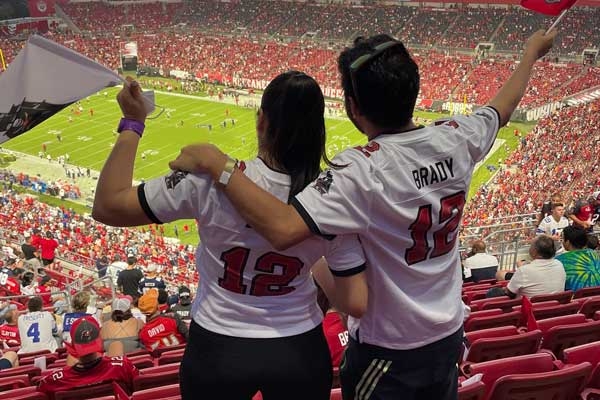 Bucs fans at a football game at Raymond James Stadium